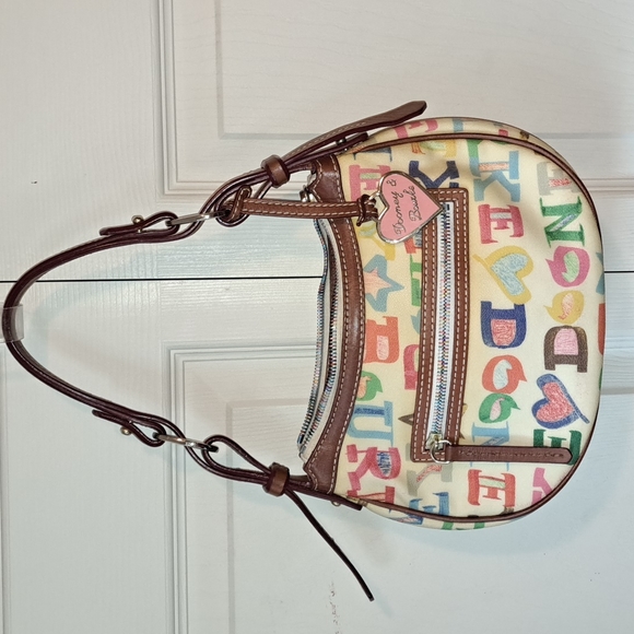 Dooney & Bourke Handbags - Vintage Dooney & Bourke "Egg Pouchette" bag